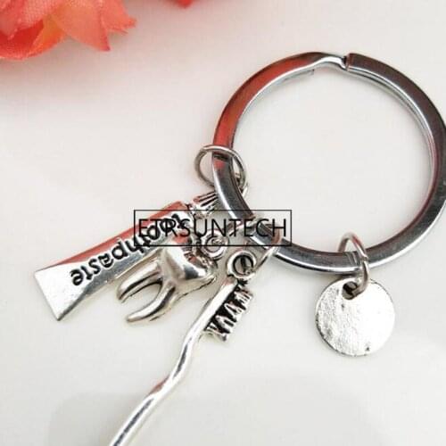 200pcs Toothbrush Toothpaste Keychain Alloy Ancient Silver Teeth Pendant Keyring Oral Health Dentist Nurse Creative Gift