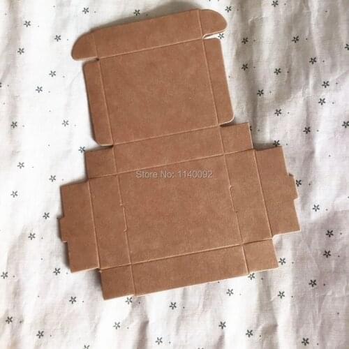 Free shipping 50 pcs a lot 6.4x6.2x2.2cm kraft paper packing box/flat cardcase/trusty pill case/top grade candy box/50 pcs a lot