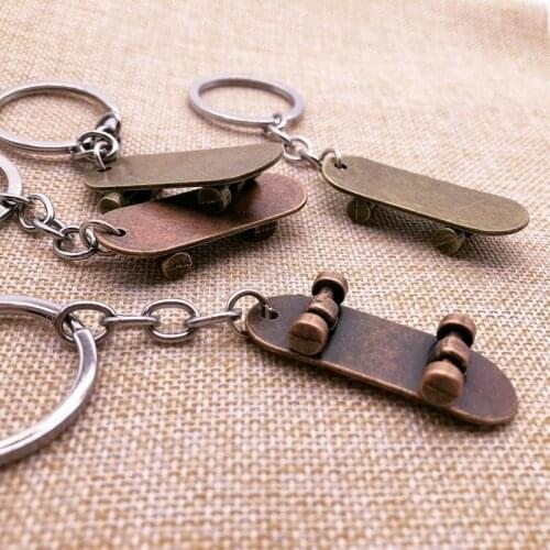 European and American Retro Heavy Metal Element Skateboard Keychain Bag Car Pendant Accessories