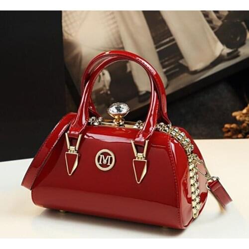 Versatile leather cross - slung new lady hand bill of lading shoulder mom mini bag big temperament trend