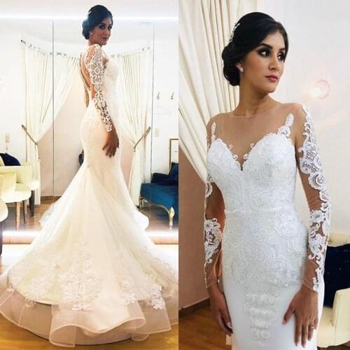 Illusion Long Sleeve Mermaid Wedding Dresses 2020 Sheer Jewel Neck Lace Applique Trumpet Sweep Train Aso Ebi Bride Wedding Gown