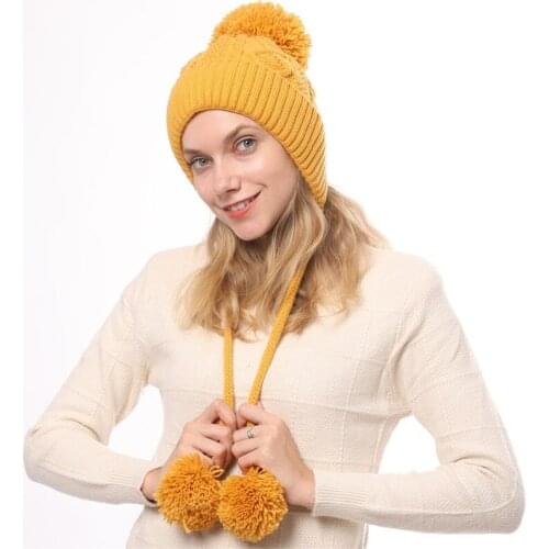 DUOJIAOYAN New Women Thick Jacquard Hat Warm Winter Cap Fashion Knitted Women Caps Hanging Spike Ear Protect Girls Hats