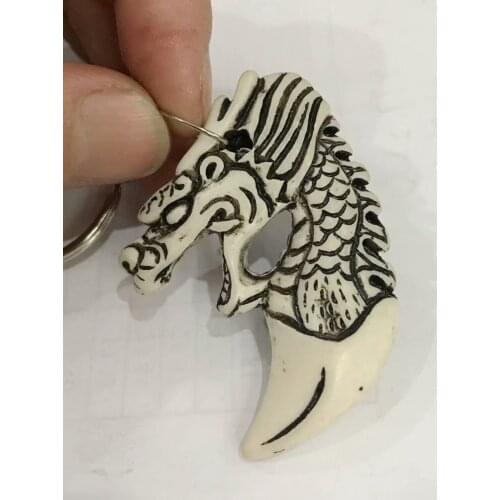 YQTDMY 12 pcs Punk Yak Bone Cute Hawaii Tribal Dragon Charms Keychain Gifts For Men Womens