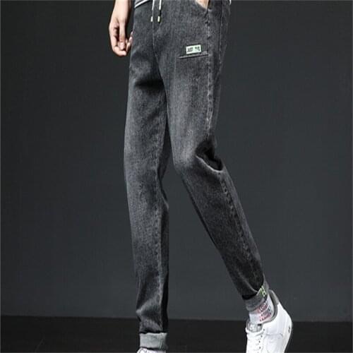 2021 autumn new mens Korean jeans mens self-cultivation trendy feet pants trousers ripped pants teenagers