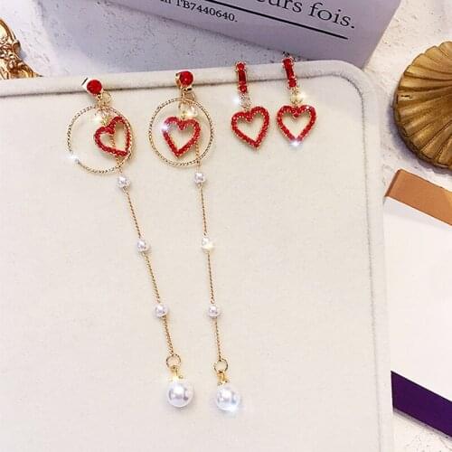 Korean version of 2021 new trend fashion simple long pearl tassel peach heart red love cute temperament earrings women