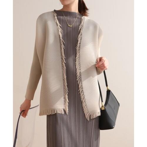 Issey Miyake Pleats with Pleats, high-end fashion, tasselled shawl and Pleats please