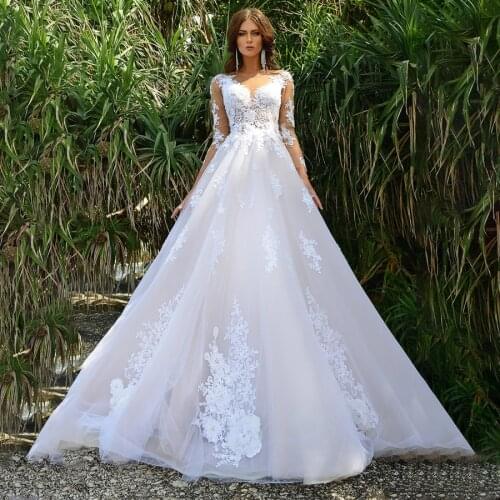 Sheer Scoop Neckline with 3D Flowers Applique Long Sleeves Nude Wedding Dress Illusion Back Sexy Bridal Gown vestidos de novia