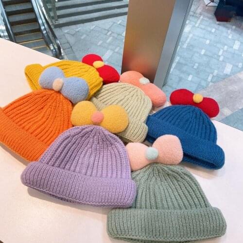 Autumn and winter child sweet and cute bow knitted woolen hat student candy color warm wild melon hat Beanie Skull Hats for Kids