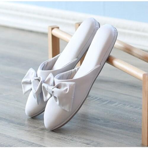 Slippers household Four Seasons General pointed fashion slippers middle heel home slope heel anti-skid home slippers