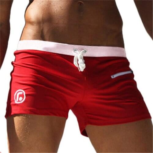 New Quick Dry Men Swimwear Solid Color Beach Wear Men Shorts Large Size Breathable Pocket Beach Shorts
