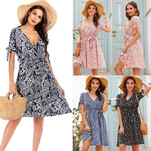 Trendy explosive French floral v-neck low-cut bow tie short-sleeved dress sexy beach style female European and American summer