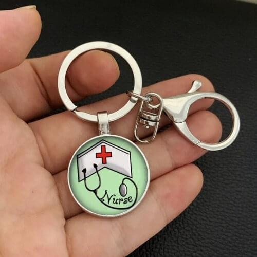 Fashion creative quality 1 piece nurse medical syringe stethoscope image keychain glass cabochon glass key ring nurse gift