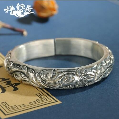 Original handmade 99 foot silver fenghuanglaiyi national style retro wide face loach back pure silver bracelet