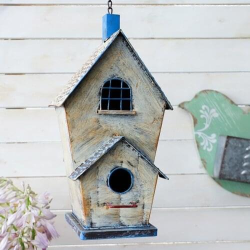 Rustic distressed colorful decorative metal birdhouse hanging