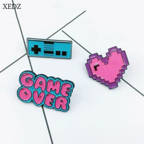 XEDZ new pink text GAME OVER blue game remote control brooch Shi Si personality pink love badge denim clothes pendant jewelry gi