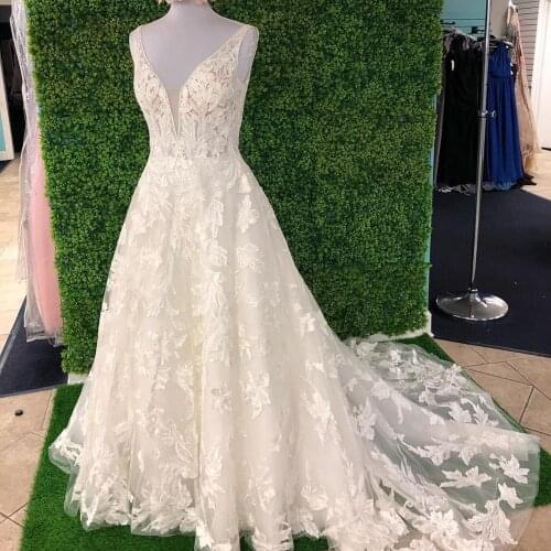Floral Lace Applique Bridal Wedding Dress 2020 A-Line V Neck Sleeveless Garden Boho Bohemian Bridal Gowns Backless Chapel Train