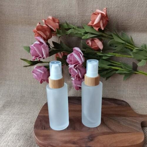 CBD hemp custom logo bamboo pump spray lotion cap cosmetic frosted glass bottle for skin care face cream 30ml 50ml 100ml 120ml