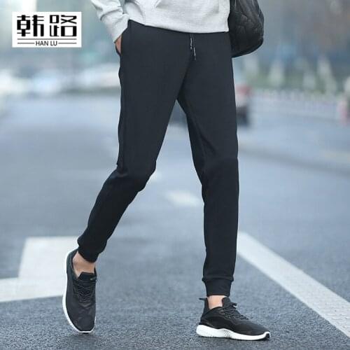 Casual mens cotton Sweatpants Spring autumn mens Solid color Straight type pants male Lace waist elastic Beam foot trousers