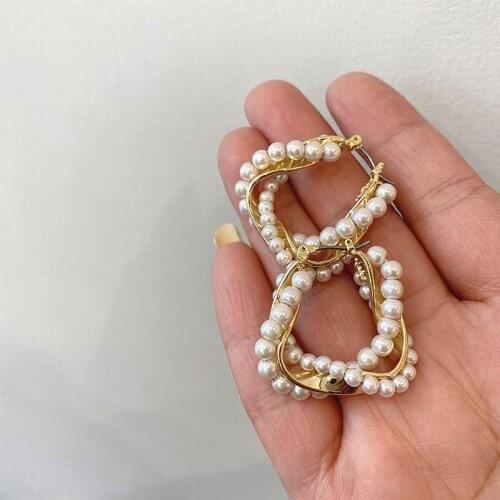 Fashion Hollow Out Geometric Pearl Metallic Twist Earrings Personality Statement New Jewelry Wholesale