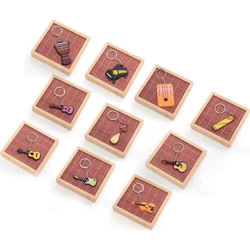 Creative musical instrument drum keychain guitar ukulele guzheng Kalimba piano pendant