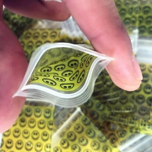 1 pack (100 pcs) Portable Tobacco Bag sealed Storage Pouch Tobacco Pouch Paper Holder Smoking Accessories Smile yellow pattern