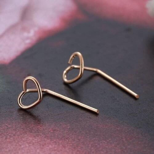 Simple Earrings Female Hollow Love Heart Ear Sticks Stud Earrings Small and Cute Pierced Jewelry Cold Wind Girlfriend Gift