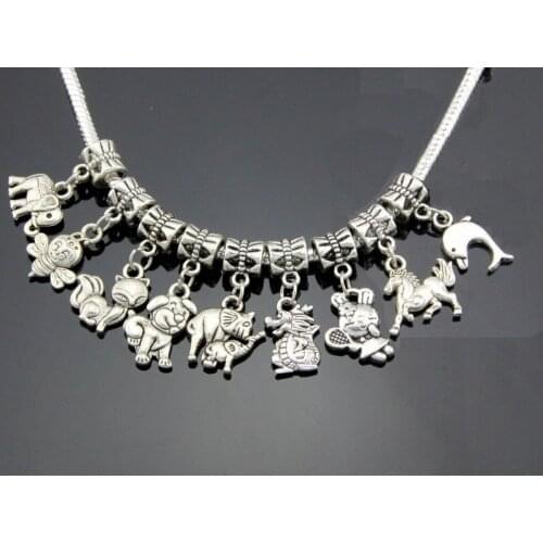 100 pcs / Lot Mix Vintage Silver Color Animals Dog Fox Dolphin Swan Dangle Charms Jewelry Findings For European Bracelet ZYY019