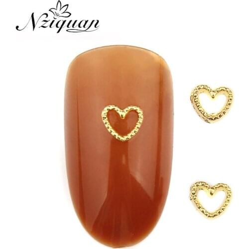 NZIQUAN new product launch 20pcs/bag 5*4.5mm3D gold foil hollow heart sparkling nail art jewelry DIY art nail stickers boutique