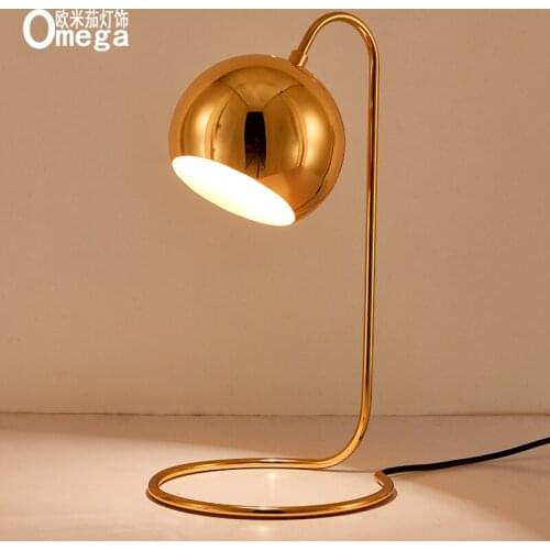 Nordic designer creative table lamp Postmodern personality gold bedroom bedside lamp room study reading lamp