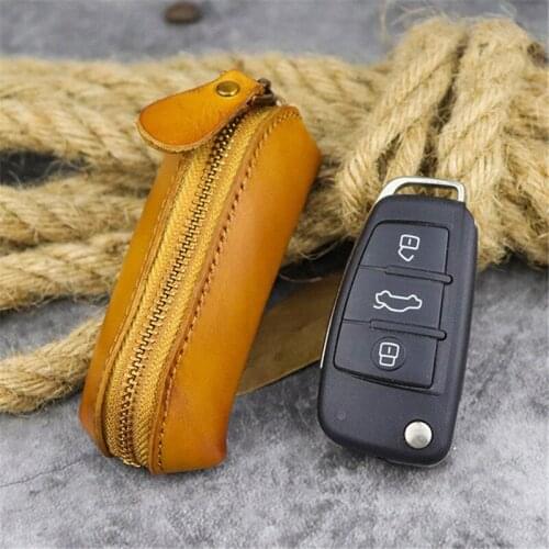 Retro casual high quality natural real leather mens and womens universal zipper car key case mini cute waist hanging bag