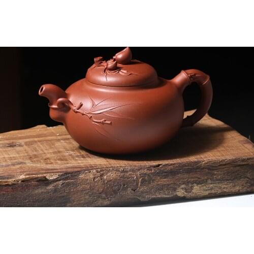 Monohydrate hall yixing recommended the teapot tea pure manual undressed ore red-skinned Long Qingfeng peach teapot