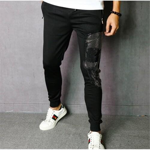 Hot-selling high-quality mens slim skull hot drilling pants casual sports pants fashion jogging pants