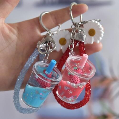 Fashion Creative Fruit Into The Oil Milk Tea Cup Keychain Trend Foreign Air Drift Bottle Zou Ju Pendant Bag Ornaments Wholesale