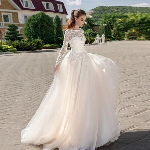 2020 Beautiful Lace Long Sleeve Wedding Dress Tulle Skirt O-Neck Illusion Top Backless Back Bridal Gowns Boho Dresses