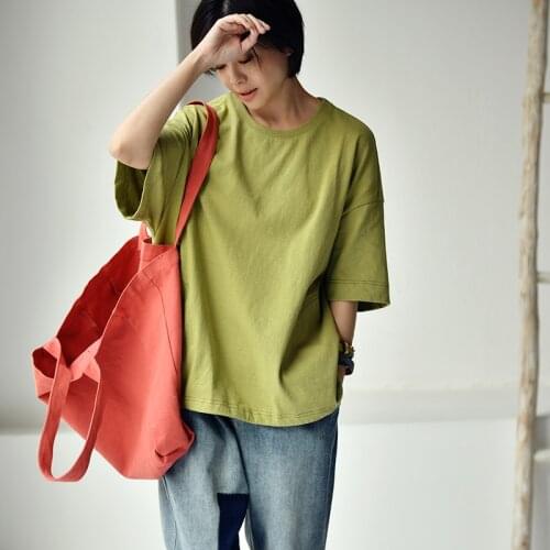 MICOCO T3756C Leisure literature and art line big pocket loose solid color round neck short sleeves T-shirt