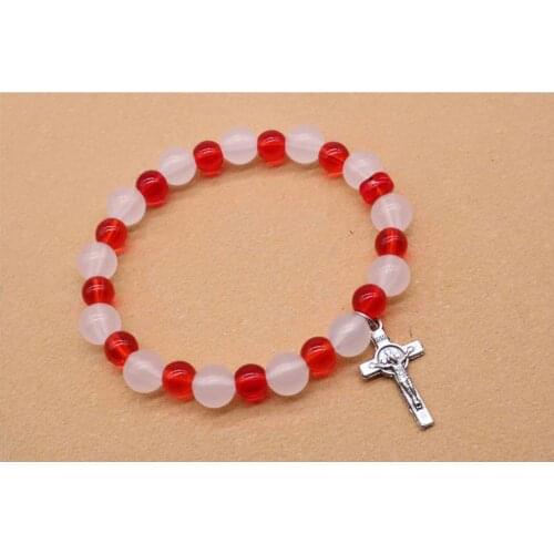 Catholic Rosary Beaded Bracelet. Jesus Christs little cross rosary bracelet. Bracelet changes color in the sun