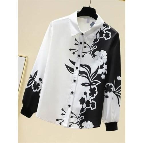 Shan liao Yi Black And White Blouses