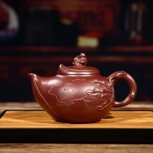 Yixing recommended kung fu tea pot all hand peach purple clay pot of tea factory mixed batch of famous Xu Yi big goods
