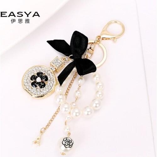 2021 New Creative Alloy Diamond Small Gift Pendant Perfume Bottle Bow Keychain Pearl Key Accessories