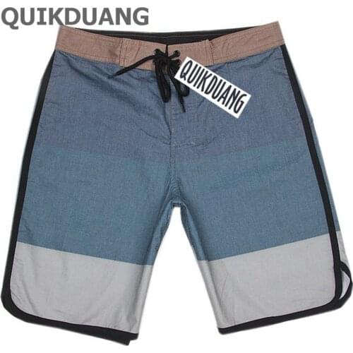 QUIKDUANG Mens Boardshorts Quick-dry Elastane Spandex Beachshorts Fashion Bermudas Shorts Mens Board Shorts Casual Shorts 30-38