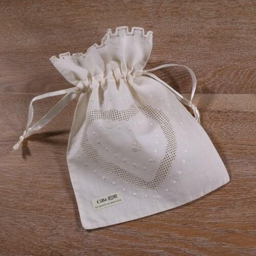 B020 : 1 piece Beige ramie cotton hand embroidery Drawnwork gift Storage bags travel pouchs Drawstring bags