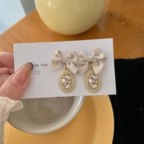 Fashion S925 French Retro Fabric Bow Pearl Earrings Female New Korean Temperament Stud Earrings Cold Trend
