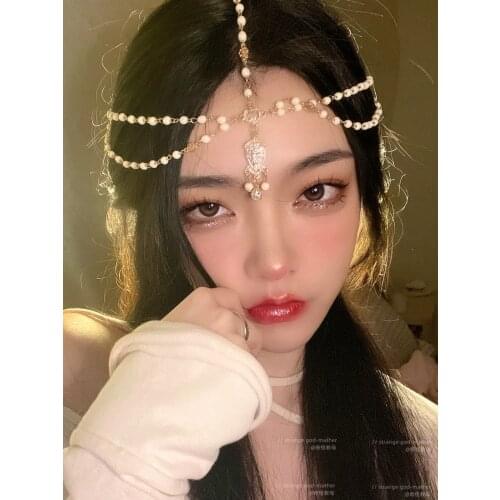 Bohemia wind headdress takes photo props female eyebrow center pendant ancient wind crystal pearl tassel hair act the role ofing