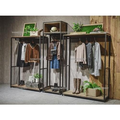 Retro nostalgic iron clothing store display rack. The Wall hanger womens clothing store decoration wall hanging decoration