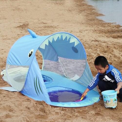 Childrens beach tents are free to install and throw away. Two people can play in the game house. New shark tents