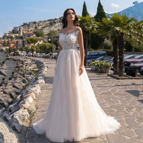 Luxury Lace Appliques A Line Wedding Dresses Sexy Backless Cap Sleeve Boho Bridal Princess Wedding Gowns for Bride Plus Size