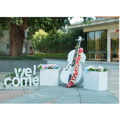 Metal cello ornaments outdoor garden wedding props park decoration sales building villa garden musical instrument sculpture