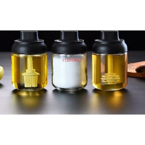 The new hot-selling moisture-proof glass sealed spoon cover integral seasoning bottle brush oil bottle honey bottle