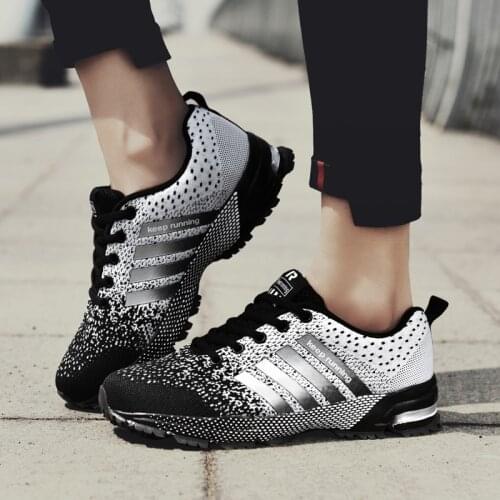 2021men Soccer Shoes Breathable Outdoor Sports Shoes Lightweight Sneakers For Women Comfortable Athletic Training Footwear