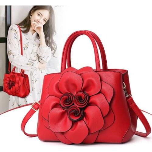 Free shipping 2020 summer wind hot style college female bag PU leather flowers hand the bill of lading shoulder bag handbag
